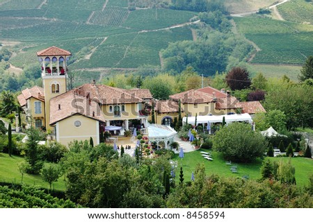 Italian luxury country hotel, surrounded by vineyards.
