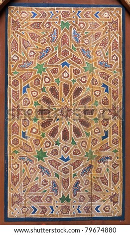 Detail of an ancient wooden arab door, example of islamic art. Marrakech, Maroc, Africa.