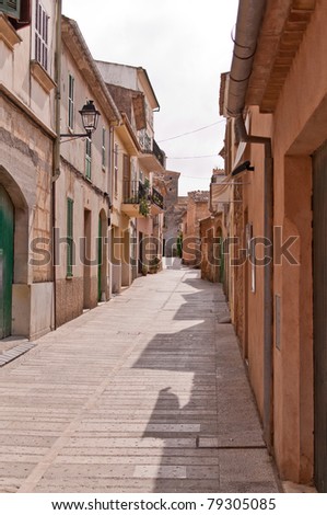 An old paved empty alleyway in southern Europe