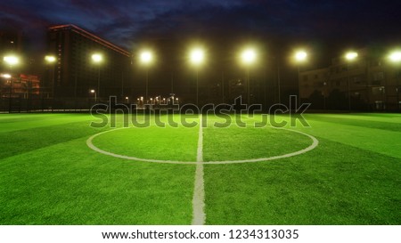empty soccer field with spot light at night, green football court for futsal training