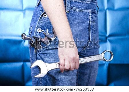 Woman holding tools