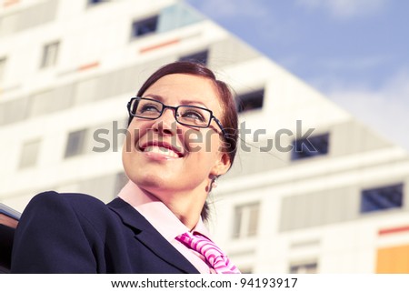 Business woman in the tie suit