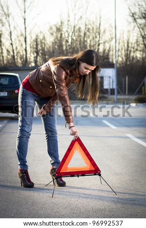Woman with broken car seeking help
