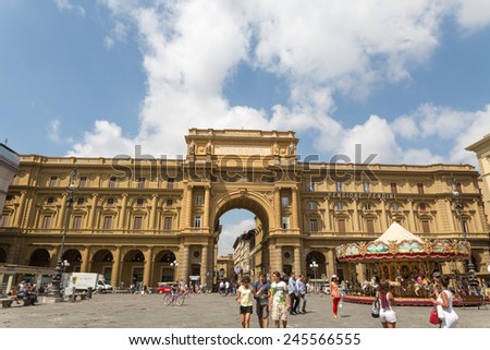 Florence, Italy, 04/08/2014 - Tourists walk in Piazza della Repubblica, Italy