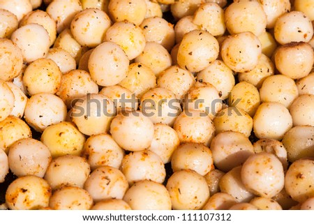 many roast round small potatos with spices