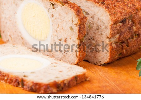 meat bread from rissoled turkey on wooden board