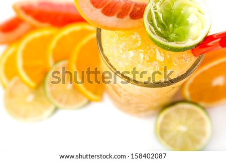 long drink orange coctail with citruses garnish