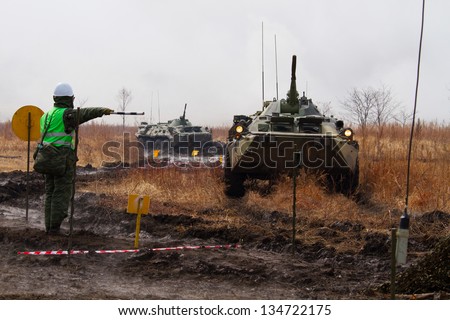 BOLSOI KAMEN, RUSSIA, - APRIL 3, 2013: Military exercises on emergency response in case of accidents at radiation-hazardous objects, Bolsoi Kamen, Russia, April 3, 2013. The military equipment.