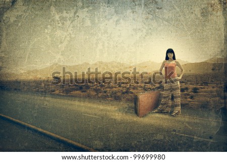 Young woman with suitcase on the road. Old style image