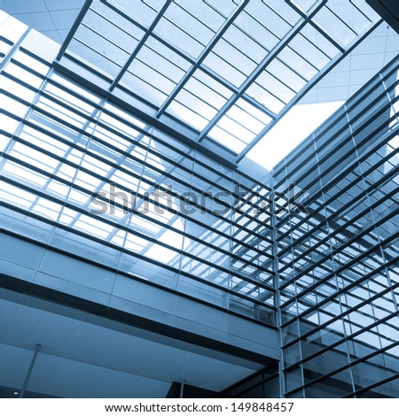 Transparent glass ceiling, modern architectural interior.
