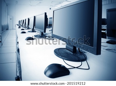 Computer Lab,Neatly placed rows of computer.
