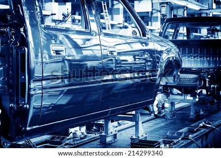 Factory floor, car production lines.