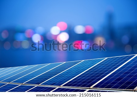Urban landscape as the background of the solar panel