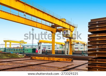Pier bridge crane and cargo handling, cargo trains transported away.