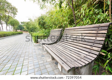 Park benches, people walking and rest.