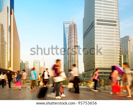 Shanghai, China, pedestrian viaduct the crowds.