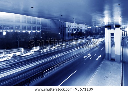 Overpass at night, heavy traffic.