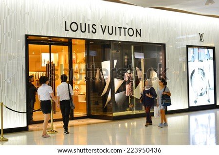 BANGKOK - OCT 29: Louis Vuitton store in Siam Paragon Shopping mall in Bangkok on October 29, 2013. It is one of the biggest shopping centres in Asia