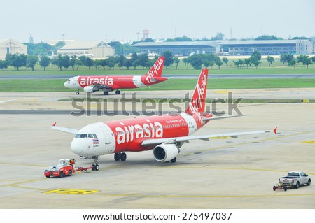 BANGKOK - April 27: Commercial aircraft wait for taking off at Don Mueang international airport on April 27, 2015 in Bangkok, Thailand. This airport is the hub of low cost airlines in Bangkok.