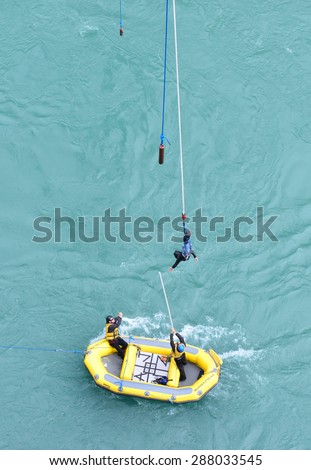 QUEENSTOWN, NZ - Nov 20:Person during bungy jump on Nov 20 2014.New Zealands Kawarau Bridge bungy site (established 1988) was the first commercial bungy operation in the world.