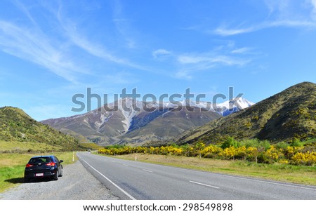Great Alpine highway, November 14,2014 : Cars parked on the road side. Arthurs Pass, New Zealand on it\'s way to the west coast.