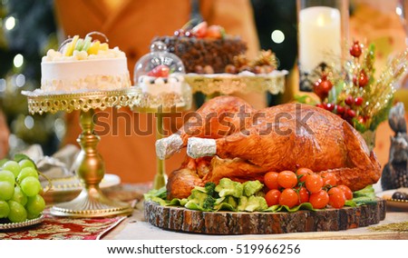 Roasted Turkey.Table served with turkey in Christmas dinner, decorated with candles.