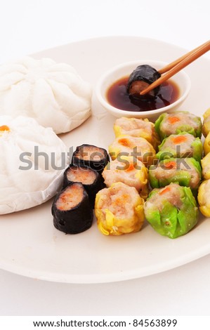 Dim sum, Chinese steamed pork , shrimp dumplings and steamed buns