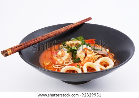 Tom Yam Koong and Squid soup with noodles :Thai cuisine