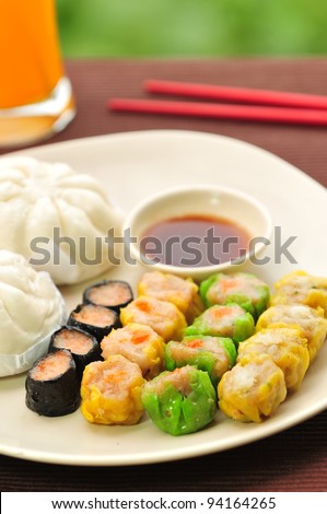 Dim sum, Chinese steamed pork , shrimp dumplings and steamed buns