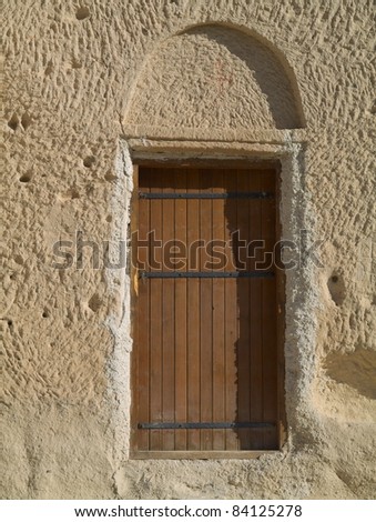 The door in the town Goreme with rock houses