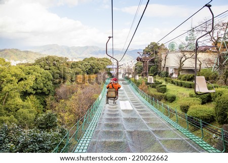 the old man sat in the ropeway of single person to the Bitchu Matsuyama Castle