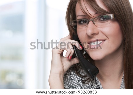 Portrait of a young woman on phone