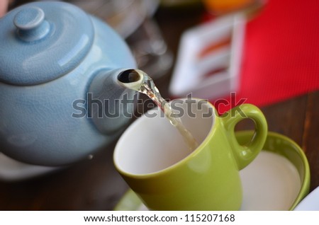 Tea Time , Pouring Tea into the cup