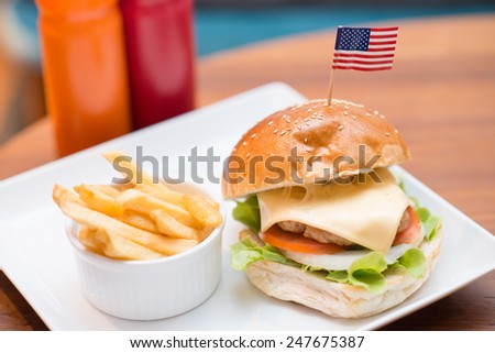 Big burger pork and cheese serve with French fries, Food