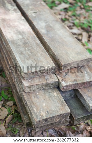 stack lumber to be used for construction, nature