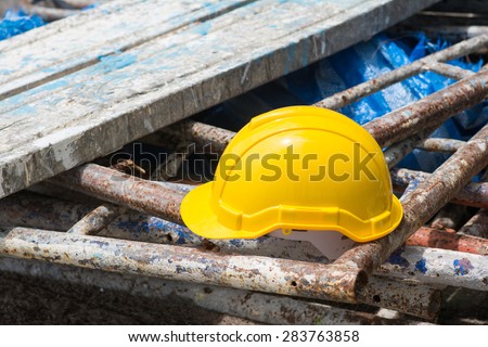 yellow hard hat in Construction Site, worker