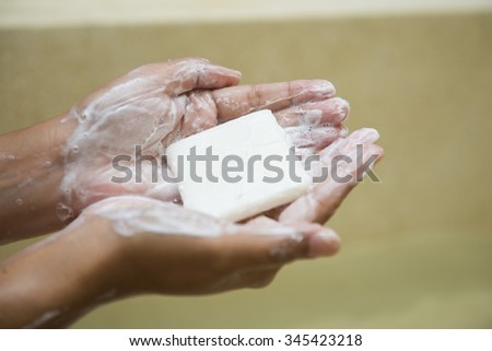 washing hands with soap in bathroom, skin