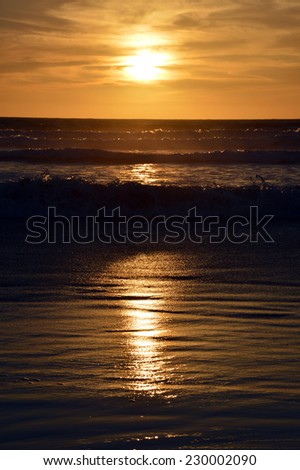 Sunset ocean  cool water  beautiful sun in the sky.