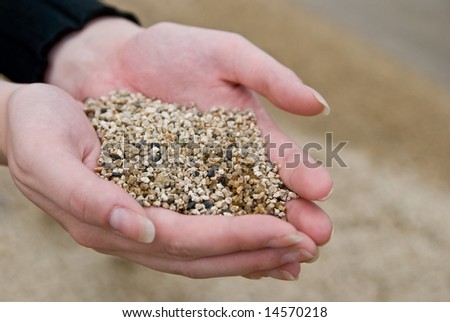 sand in female hands