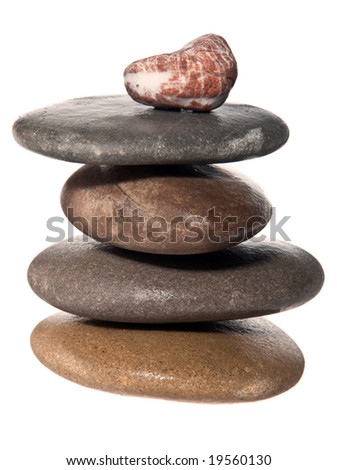 An isolated balanced stone tower on white background