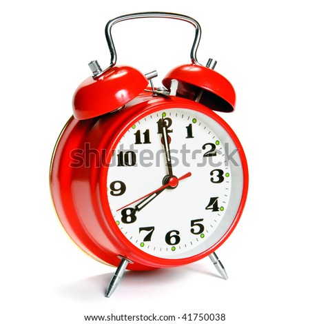 Red vintage alarm clock isolated on white