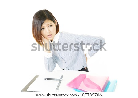 The female office worker who is troubled with lower back pain