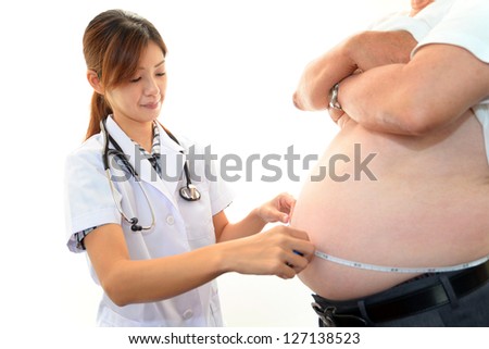 Woman doctor with a medical examination in obese patient Woman doctor with a medical examination in obese patient