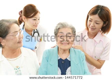 Medical staff with senior women