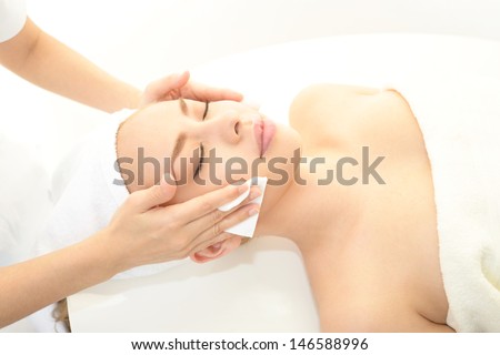 Pretty Woman Receiving Facial Massage