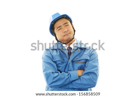 Tired construction worker isolated on white background