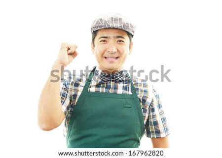 Smiling Asian waiter
