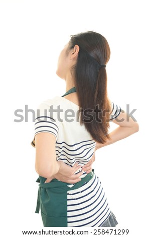 Woman with the low back pain