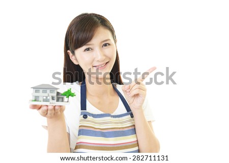 house wife with house model