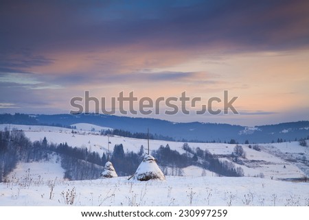 Sunrise in winter mountains